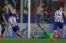 Atletico's Koke celebrates after scoring the opening goal during the Champions League quarterfinal second leg soccer match between Atletico Madrid and FC Barcelona at the Vicente Calderon stadium in Madrid, Spain, Wednesday, April 9, 2014. (AP Photo/Andres Kudacki)