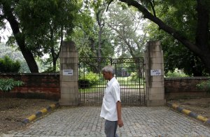 A man walks past the Faridkot estate, in New Delhi, …