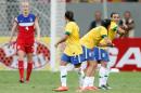 Brazil's Marta Vieira, right, celebrates with teammates after scoring against the United States during a match of the International Women's Football Tournament at the National Stadium in Brasilia, Brazil, Sunday, Dec. 14, 2014. (AP Photo/Eraldo Peres)