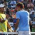 Verdasco of Spain congratulates Federer of Switzerland after their men's singles match at the U.S. Open tennis tournament in New York