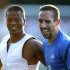 France's soccer players Evra and Ribery attend a training session at the team's training center in Kircha near Donetsk during the Euro 2012