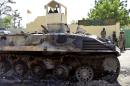 A Boko Haram' tank destroyed by Cameroonian soldiers stands in front of a military base in Amchide, northern Cameroon on October 15, 2014