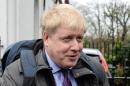 Mayor of London Boris Johnson talks to journalists as he leaves his home in London on February 22, 2016