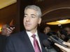 File photograph of William Ackman talking to reporters before AGM of CP Rail in Calgary