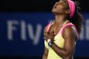 Serena Williams of the U.S. reacts as she plays Maria Sharapova of Russia during the women's singles final at the Australian Open tennis championship in Melbourne, Australia, Saturday, Jan. 31, 2015. (AP Photo/Rob Griffith)
