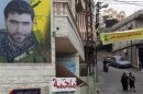 A poster of Mohamed Hassan Shehade, a Hezbollah fighter who died in the Syrian conflict, hangs on a building in Adloun town, south of Sidon