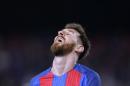 FC Barcelona's Lionel Messi reacts during the Spanish La Liga soccer match between FC Barcelona and Espanyol at the Camp Nou in Barcelona, Spain, Sunday, Dec. 18, 2016. (AP Photo/Manu Fernandez)