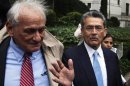 Rajat Gupta departs Manhattan Federal Court with his lawyer, Gary Naftalis after being sentenced in New York