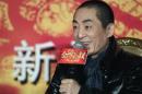 Chinese director Zhang Yimou answers a question during a news conference for his new movie "the 13 Women of Nanjing" in Beijing