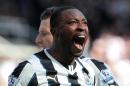 Newcastle's Nigerian striker Shola Ameobi celebrates after scoring his team's first goal during the English Premier League football match between Newcastle United and Swansea City at St James' Park in Newcastle, northeast England on April 19, 2014