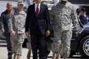 President Barack Obama walks with Gen. Lloyd Austin, vice chief of staff of the U.S. Army, right, to greet members of the military and their families on the tarmac, upon his arrival at Biggs Airfield at Fort Bliss, Texas, Friday, Aug. 31, 2012. (AP Photo/Pablo Martinez Monsivais)