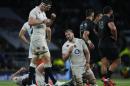 England captain Chris Robshaw gets up as the final whistle blows during their international rugby union match against New Zealand at Twickenham stadium, London, Saturday, Nov. 8, 2014. New Zealand won the game 24-21. (AP Photo/Alastair Grant)