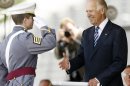Vice President Joe Biden presents a diploma to valedictorian Alexander George Pagoulatos during a graduation and commissioning ceremony at the U.S. Military Academy in West Point, N.Y., on Saturday, May 26, 2012. (AP Photo/Mike Groll)