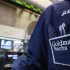 A trader works at the Goldman Sachs stall on the floor of the New York Stock Exchange
