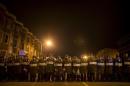 Police line up shortly after the deadline for a city-wide curfew at North Ave and Pennsylvania Ave in Baltimore, Maryland