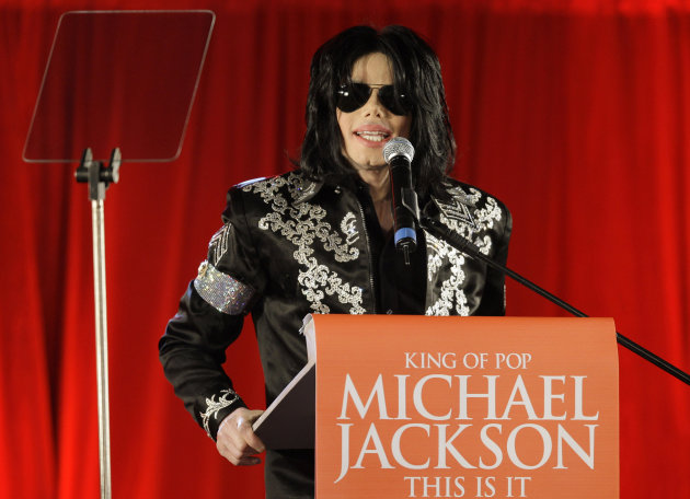 FILE - In this March 5, 2009 file photo, US singer Michael Jackson announces that he is set to play ten live concerts at the London O2 Arena in July, which he announced at a press conference at the London O2 Arena. Jurors heard “This Is It” Director Kenny Ortega recount Jackson’s brilliance and frailties during an emotional testimony in Los Angeles on Wednesday, July 10, 2013, in a case filed by Jackson’s mother Katherine Jackson, against concert promoter AEG Live LLC. (AP Photo/Joel Ryan, File)