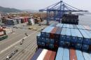 Trucks used to transport containers are seen at the Hanjin Shipping container terminal at the Busan New Port in Busan