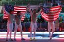 From left to right, Race Imboden, Gerek Meinhardt, Alexander Massialas, Miles Chamley-Watson, celebrates after defeating Italy team in the Bronze medal men's team foil competition at the 2016 Summer Olympics in Rio de Janeiro, Brazil, Friday, Aug. 12, 2016. (AP Photo/Vincent Thian)