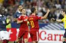 Belgium's Eden Hazard, right, reacts after scoring the fourth goal during the international friendly soccer match between France and Belgium at the Stade de France, north of Paris, France, Sunday, June 7, 2015. (AP Photo/Michel Spingler)