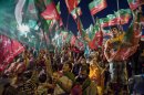 Supporters of Pakistan Tehreek-e-Insaf or Moment for Justice party attend an election campaign rally in Islamabad, Pakistan, Thursday, May 9, 2013. Pakistan is scheduled to hold parliamentary elections on May 11, the first transition between democratically elected governments in a country that has experienced three military coups and constant political instability since its creation in 1947. The parliament's ability to complete its five-year term has been hailed as a significant achievement. (AP Photo/Anjum Naveed)