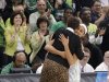 Notre Dame guard Skylar Diggins right gets a hug from coach Muffet McGraw during the second half of the regional final of the NCAA women's college basketball tournament Tuesday, April 2, 2013, in Norfolk, Va. Notre Dame won 87-76. (AP Photo/Steve Helber)