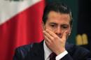 Mexico's President Enrique Pena Nieto gestures during the 37th session of the public national security council in Mexico City