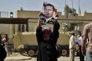 A supporter of former Egyptian president Hosni Mubarak raises up his portrait at Tora prison on August 22, 2013 in Cairo