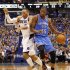 Oklahoma City Thunder's Durant and Dallas Mavericks' Marion collide during their NBA Western Conference quarter-final playoff basketball game in Dallas