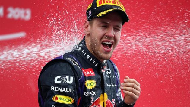 Sebastian Vettel is sprayed with champagne on the podium after the Korean GP (Getty)