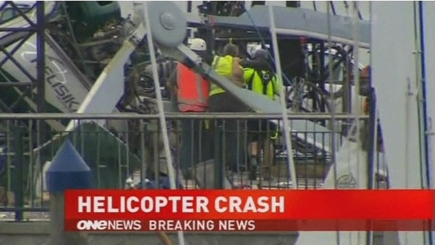 A helicopter crashes while installing a Christmas tree in Auckland in this still image taken from video