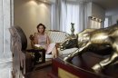 Gigi Chao, the daughter of Hong Kong property tycoon Cecil Chao Sze-tsung, poses at the conference room of her office in Hong Kong