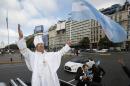 Daniel Francisco Venezia, an Argentina soccer fan dressed as Pope Francis, waves the Argentine flag the morning of the final Brazil World Cup match between Argentina and Germany, in Buenos Aires, Argentina, Sunday, July 13, 2014. (AP Photo/Jorge Saenz)