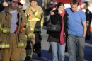 Victims family leave a firehouse staging area following a shooting at the Sandy Hook School in Newtown, Conn. where authorities say a gunman opened fire, leaving 27 people dead, including 20 children, Friday, Dec. 14, 2012. (AP Photo/Jessica Hill)