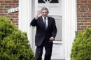 Former World Bank president Paul Wolfowitz leaves his house in the Washington suburb of Chevy Chase