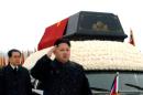 FILE - In this Dec. 28, 2011 file photo, North Korea's leader, Kim Jong Un, front center, is followed by his uncle Jang Song Thaek, vice chairman of the National Defense Commission, as he salutes beside the hearse carrying the body of his late father North Korean leader Kim Jong Il during the funeral procession in Pyongyang, North Korea. North Korea on Monday, Dec. 9, 2013, acknowledged the purge of leader Kim Jong Un's influential uncle for alleged corruption, drug use, gambling and a long list of other "anti-state" acts, apparently ending the career of the country's second most powerful official. The young North Korean leader will now rule without the relative long considered his mentor as he consolidated power after the death of his father, Kim Jong Il, two years ago. (AP Photo/Kyodo News, File) JAPAN OUT, MANDATORY CREDIT