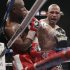 Miguel Cotto throws a flurry of punches against Floyd Mayweather Jr. in the seventh round during a WBA super welterweight title fight, Saturday, May 5, 2012, in Las Vegas.  (AP Photo/Eric Jamison)