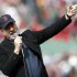 Neil Diamond sings '"Sweet Caroline" during the eighth inning of a baseball game between the Boston Red Sox and the Kansas City Royals in Boston, Saturday, April 20, 2013. (AP Photo/Michael Dwyer)