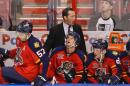 Kevin Dineen of the Florida Panthers directs players on November 1, 2013 in Sunrise, Florida