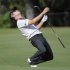 Johnson of the U.S. reacts after his shot from the 11th fairway during the third round of the Players Championship PGA golf tournament in Ponte Vedra Beach