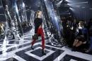A model presents a creation by French designer Nicolas Ghesquiere as part of his Fall/Winter 2016/2017 women's ready-to-wear collection show for Louis Vuitton in Paris