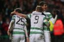 Celtic's players celebrate during a match at Celtic Park in Glasgow on February 19, 2015