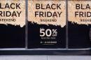 Retail stores display "Black Friday" advertisements and banners on Oxford Street in central London, as the annual retail event takes place on November 27, 2015