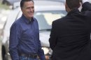 Republican presidential candidate, former Massachusetts Gov. Mitt Romney leaves his headquarters in Boston, Friday, Aug. 17, 2012. (AP Photo/Evan Vucci)