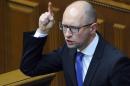 This handout picture taken and released by the Ukrainian Prime Minister Press-Service on July 24, 2014 shows Ukrainian Prime Minister Arseniy Yatsenyuk as he addresses members of parliament during a parliamentary session in Kiev
