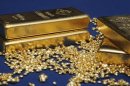 Gold bars and granules are pictured at the Austrian Gold and Silver Separating Plant 'Oegussa' in Vienna