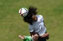 France's Wendie Renard (2) heads the ball over Mexico's Charlyn Corral during the first half of a FIFA Women's World Cup soccer match in Ottawa, Ontario, Canada, Wednesday, June 17, 2015. (Sean Kilpatrick/The Canadian Press via AP) MANDATORY CREDIT