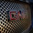 A General Motors logo is seen on a Denali vehicle for sale at the GM dealership in Carlsbad