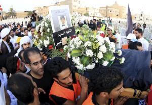 Shi&#39;ite Muslims carry the coffin of a Saudi boy &hellip;