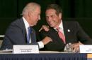 Vice President Joe Biden, left, New York Gov. Andrew Cuomo, chat during the Association for a Better New York luncheon, in New York, Monday, July 27, 2015. Cuomo introduced a plan to redesign and rebuild New York City's LaGuardia airport. The airport in Queens is one of the busiest in the nation, but is cramped and outdated. Vice President Joe Biden last year dubbed it a "Third World country." (AP Photo/Richard Drew)