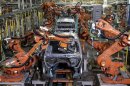 Auto assembly line robots weld on the frame of 2009 Dodge Ram pick-up trucks at the Warren Truck Assembly Plant in Warren, Michigan